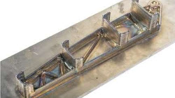 Photograph of additive manufactured Ti-6Al-4V structure for residual stress measurement.
